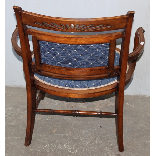 72 - An unusual Edwardian open armchair with blue fabric seat and back