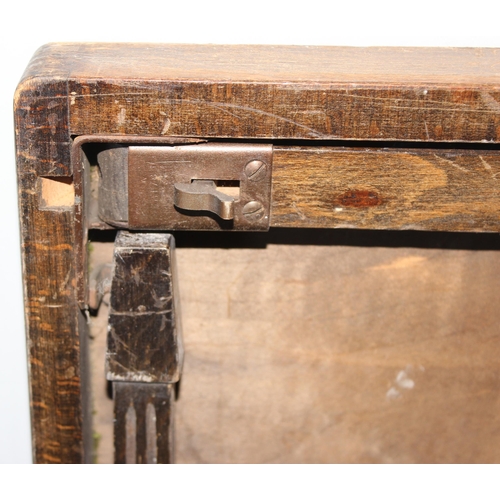 75 - A vintage folding felt topped card table, approx 76cm square x 68cm tall