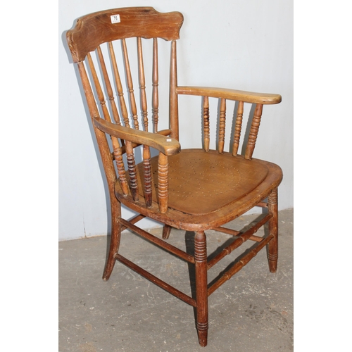 76 - An early 20th century armchair with bentwood seat and turned supports