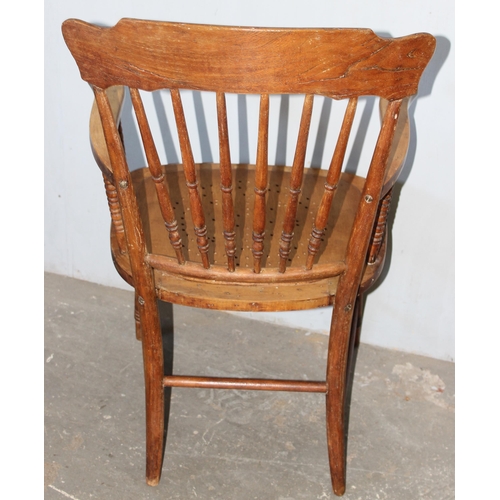 76 - An early 20th century armchair with bentwood seat and turned supports