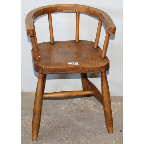 77 - A vintage Elm child's horseshoe chair, likely early 20th century, approx 48cm tall