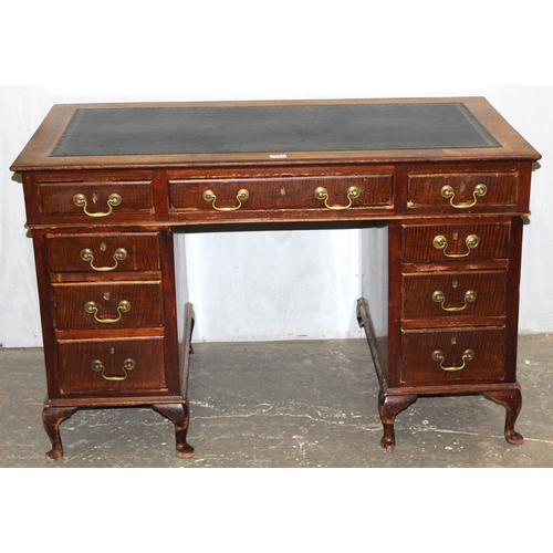 141 - An early 20th century mahogany 3 piece pedestal desk with brass handles and green tooled leather top... 