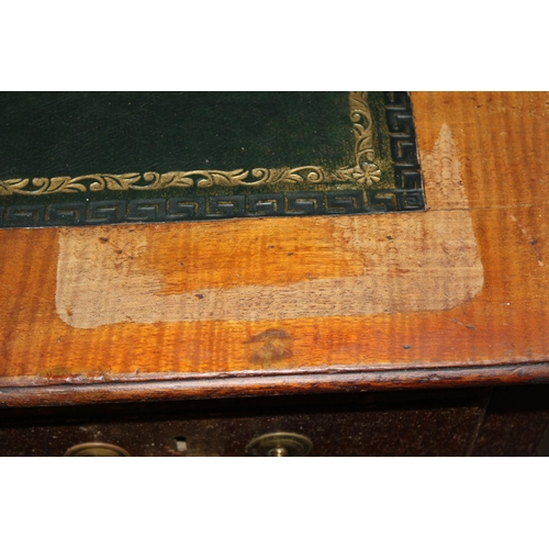 141 - An early 20th century mahogany 3 piece pedestal desk with brass handles and green tooled leather top... 