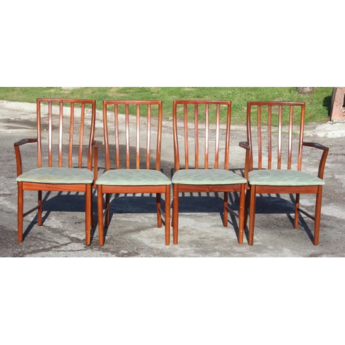 93 - A retro McIntosh extending dining table and 4 chairs, the table approx 158cm wide x 92cm deep x 76cm... 