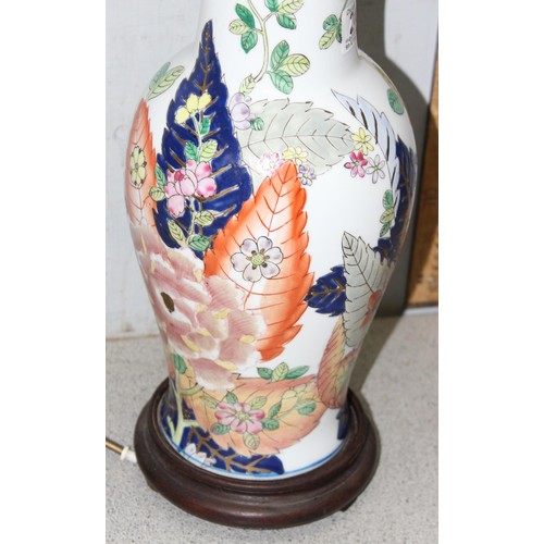 249 - Colourful hand painted floral vase converted into a lamp with wooden base, approx 50cm tall