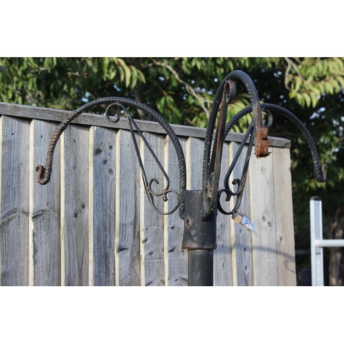 335 - Cast iron hanging basket holder, approx 204cm tall