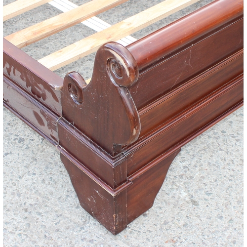 55 - An antique style mahogany sleigh bed with slats, no mattress, approx 220cm long x 162cm wide x 100cm... 