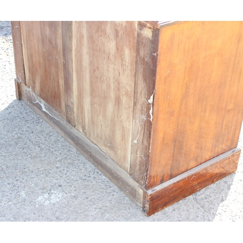 44 - An antique mahogany 2 over 2 chest of drawers with bun handles, approx 117cm wide x 55cm deep x 90cm... 