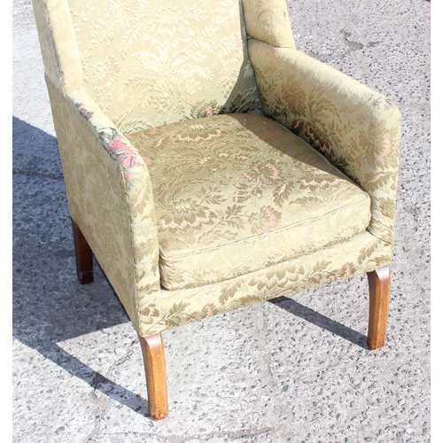 37 - A vintage William & Mary style high backed armchair with pale green upholstery, likely c.1900, appro... 