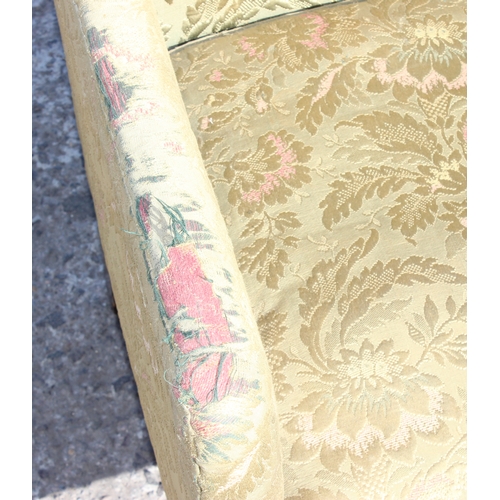 37 - A vintage William & Mary style high backed armchair with pale green upholstery, likely c.1900, appro... 