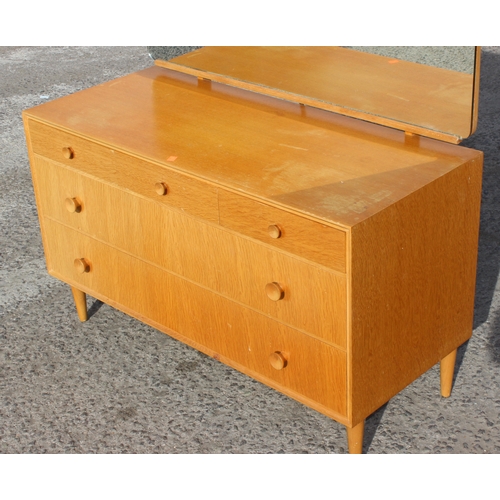 19 - A retro 3 over 2 light oak dressing table chest with mirror, approx 107cm wide x 46cm deep x 130cm t... 