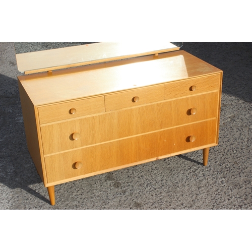 19 - A retro 3 over 2 light oak dressing table chest with mirror, approx 107cm wide x 46cm deep x 130cm t... 