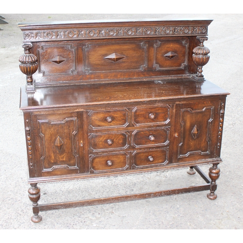 29 - An early 20th century oak court cupboard style sideboard, approx 152cm wide x 51cm deep x 143cm tall