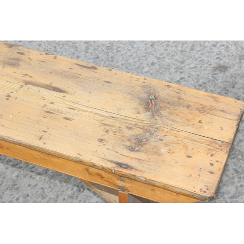 27 - A vintage pine low bench, approx 183cm wide x 28cm deep x 50cm tall