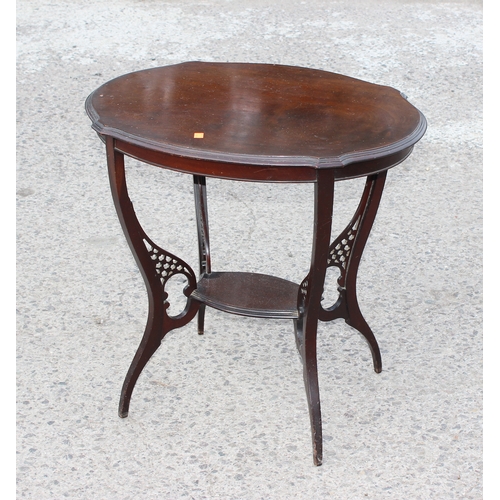 36 - A late 19th or early 20th century mahogany side table with fretwork carved details, approx 68cm wide... 