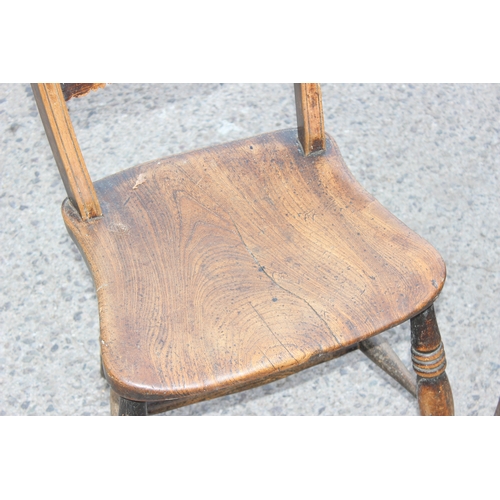 39 - A pair of antique elm seated Oxford chairs, likely 19th century, each approx 82cm tall