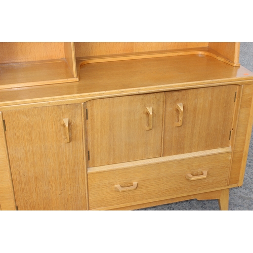 11 - A retro E Gomme G-Plan light oak highboard sideboard with gold stamped label, approx 122cm wide x 45... 