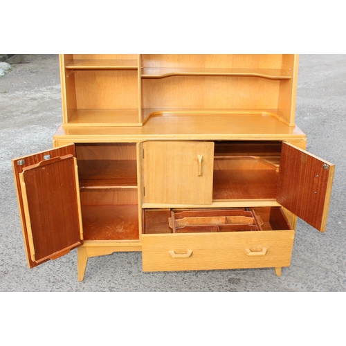 11 - A retro E Gomme G-Plan light oak highboard sideboard with gold stamped label, approx 122cm wide x 45... 