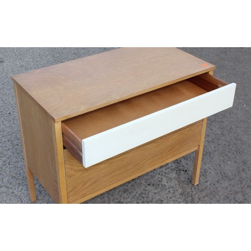 14 - Richard Young for E Gomme G-Plan, a retro 3 drawer chest of drawers with white top drawer, gold stam... 