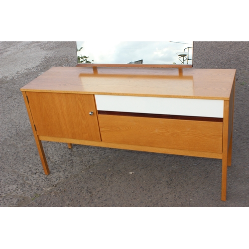 12 - A retro E Gomme G-Plan light oak 2 drawer dressing table with mirror with gold stamped label, approx... 