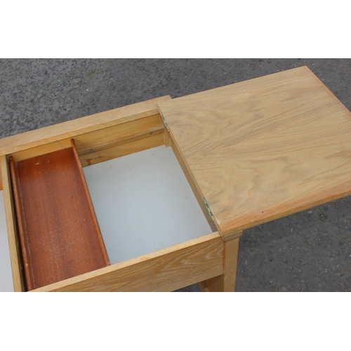 16 - G Plan - Young Ideas Range - A retro 20th century light oak dressing table desk having a teak framed... 