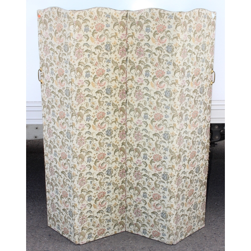 54 - A vintage 4 fold room divider or dressing screen covered in William Morris style fabric decorated wi... 