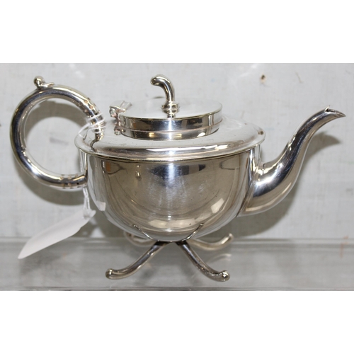 1007 - In the manner of Dr Christopher Dresser for Martin Hall & Co, an early 20th century 3 piece silver p... 