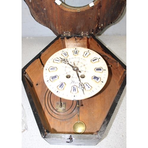 1300 - A 19th century French vineyard clock by Hageman, approx 55cm x 46cm