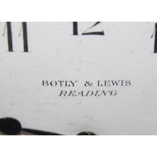 1301 - Small wooden mantel clock by Botley & Lewis of Reading with mechanical movement, approx 14cm tall