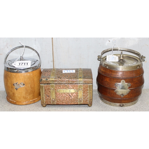 1711 - 2 barrel shaped biscuit/tea caddies and a copper and brass lined tea caddy on ball feet (3)