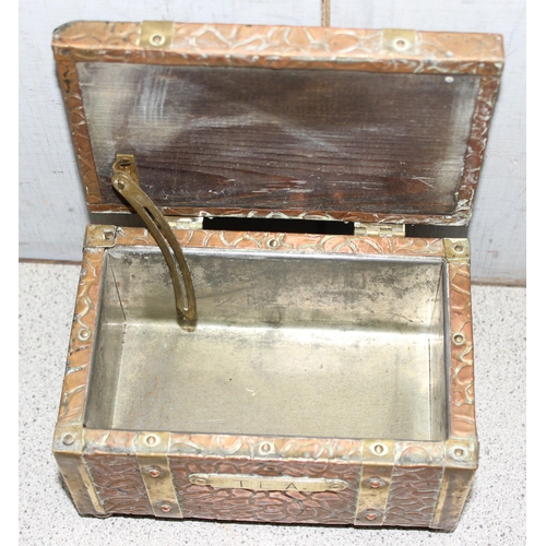 1711 - 2 barrel shaped biscuit/tea caddies and a copper and brass lined tea caddy on ball feet (3)