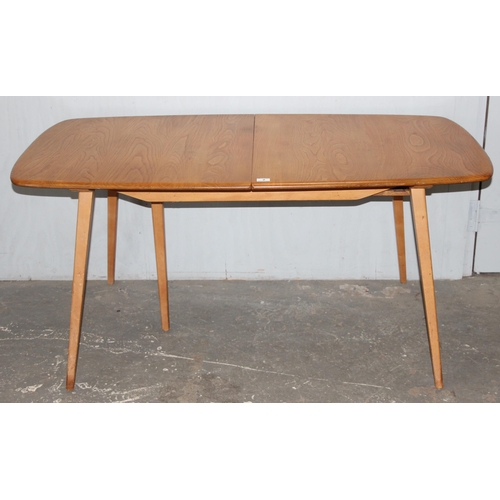 2 - A blonde Ercol extending dining table with 2 pull out leaves, approx 154cm (extending to 224cm) x 83... 