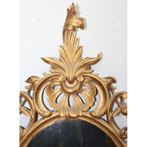 402 - A large antique carved giltwood wall mirror, likely 19th century in the Rococo manner, approx 110cm ... 