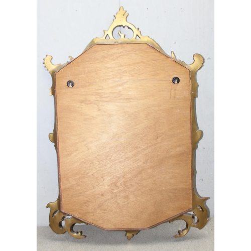 403 - A vintage Rococo style wall mirror made from carved wood, likely early 20th century, approx 89cm x 6... 