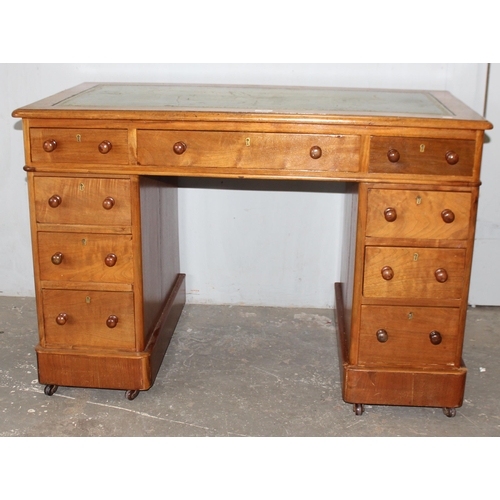 59 - An antique green leather topped 3 piece pedestal desk, approx 106cm wide x 57cm deep x 73cm tall