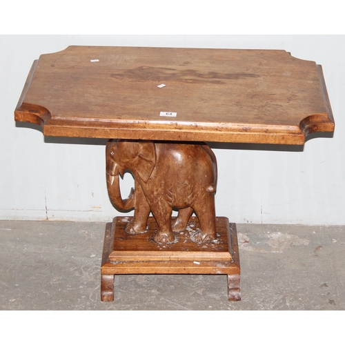 64 - An unusual vintage carved wooden table with elephant base, approx 77cm wide x 52cm deep x 54cm tall