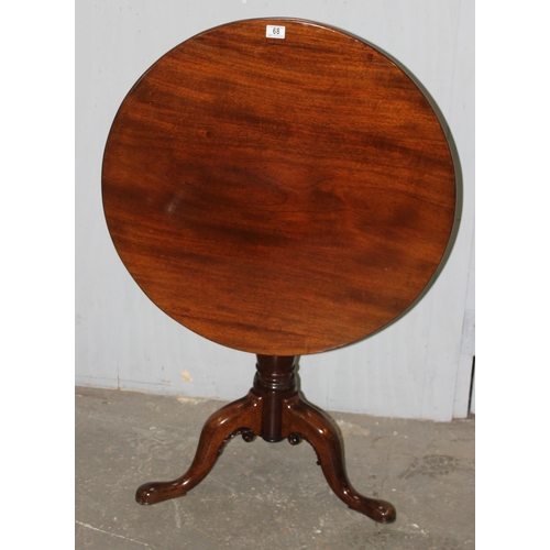 68 - A Georgian tilt top mahogany table with tripod base and pad feet, approx 79cm wide x 79cm deep x 72c... 