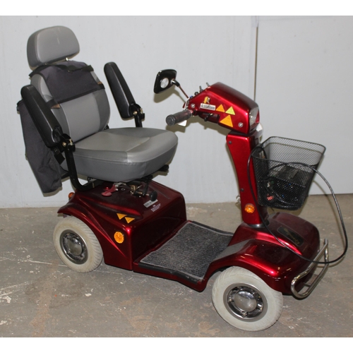 703 - Rascal mobility scooter, with charger and battery, currently working but sold without guarantee