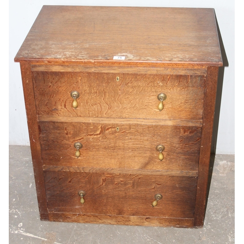 75 - A vintage oak 3 drawer chest of drawers with brass drop handles, approx 71cm wide x 49cm deep x 78cm... 