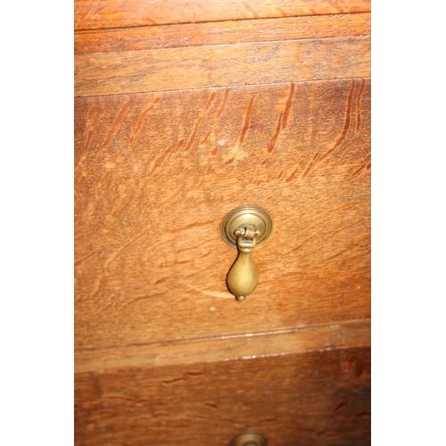 75 - A vintage oak 3 drawer chest of drawers with brass drop handles, approx 71cm wide x 49cm deep x 78cm... 