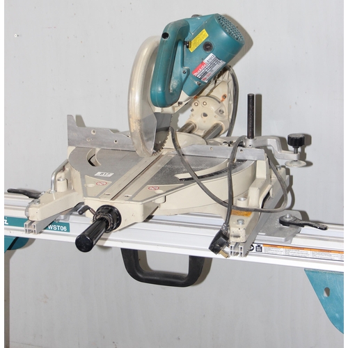 817 - Makita LS1013 chop saw on stand