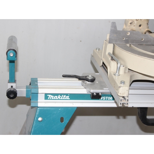 817 - Makita LS1013 chop saw on stand