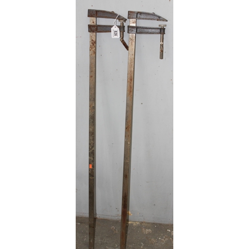 826 - Pair of sash clamps, each approx 130cm long