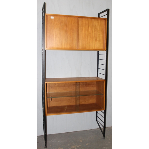 6 - Robert Heal for Staples of Cricklewood, a retro Ladderax modular unit with 2 wooden cupboards, appro... 