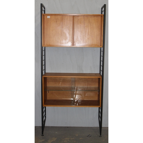 6 - Robert Heal for Staples of Cricklewood, a retro Ladderax modular unit with 2 wooden cupboards, appro... 