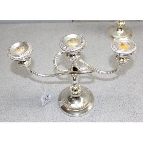 1021 - A pair of vintage silver plated 3 branch candelabra