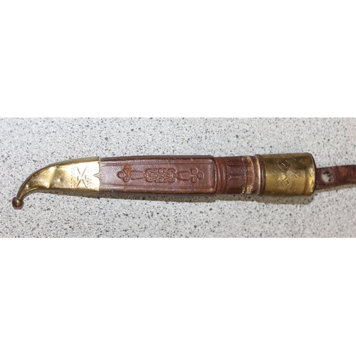 1417 - A good quality 'Puukko' knife in sheath with horse-head pommel and engraved blade c.1900, approx 23c... 