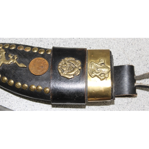 1434 - Small presentation Kukri knife with embossed blade in sheath with studded details, approx 28cm