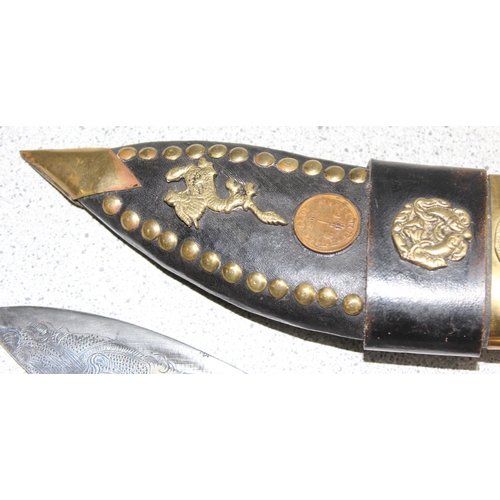 1434 - Small presentation Kukri knife with embossed blade in sheath with studded details, approx 28cm