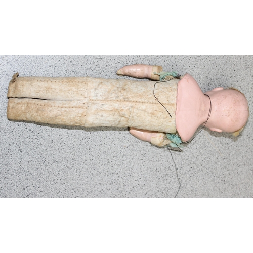 1511 - An unusual antique papier mache doll with fabric body, approx 29cm tall